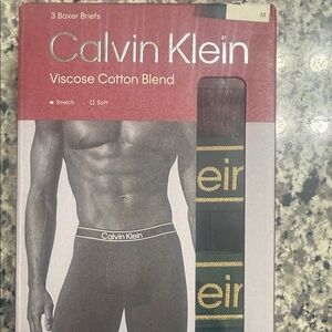 Calvin Klein Black and Gold Boxer Briefs brand new never opened